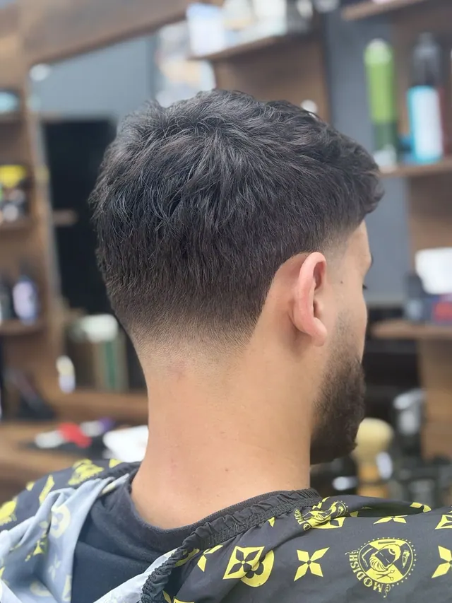 A crop with a taper fade, from behind